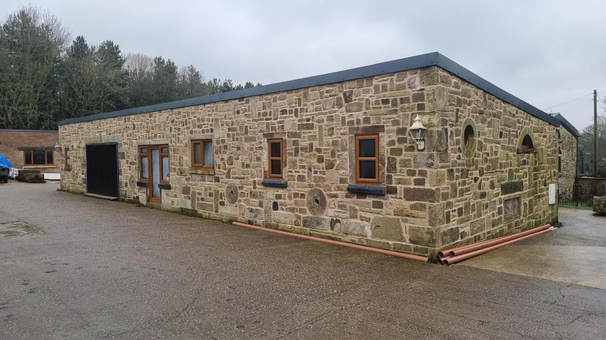 Completed single-storey stone barn conversion